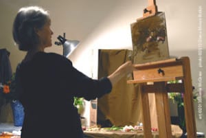 Sherrie McGraw painting a still life