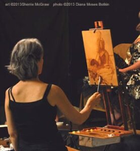 Sherrie painting a costumed figure