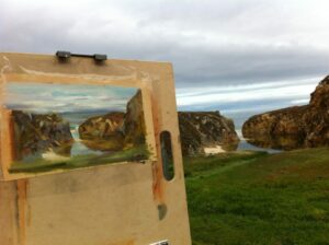 painting of cliffs and water